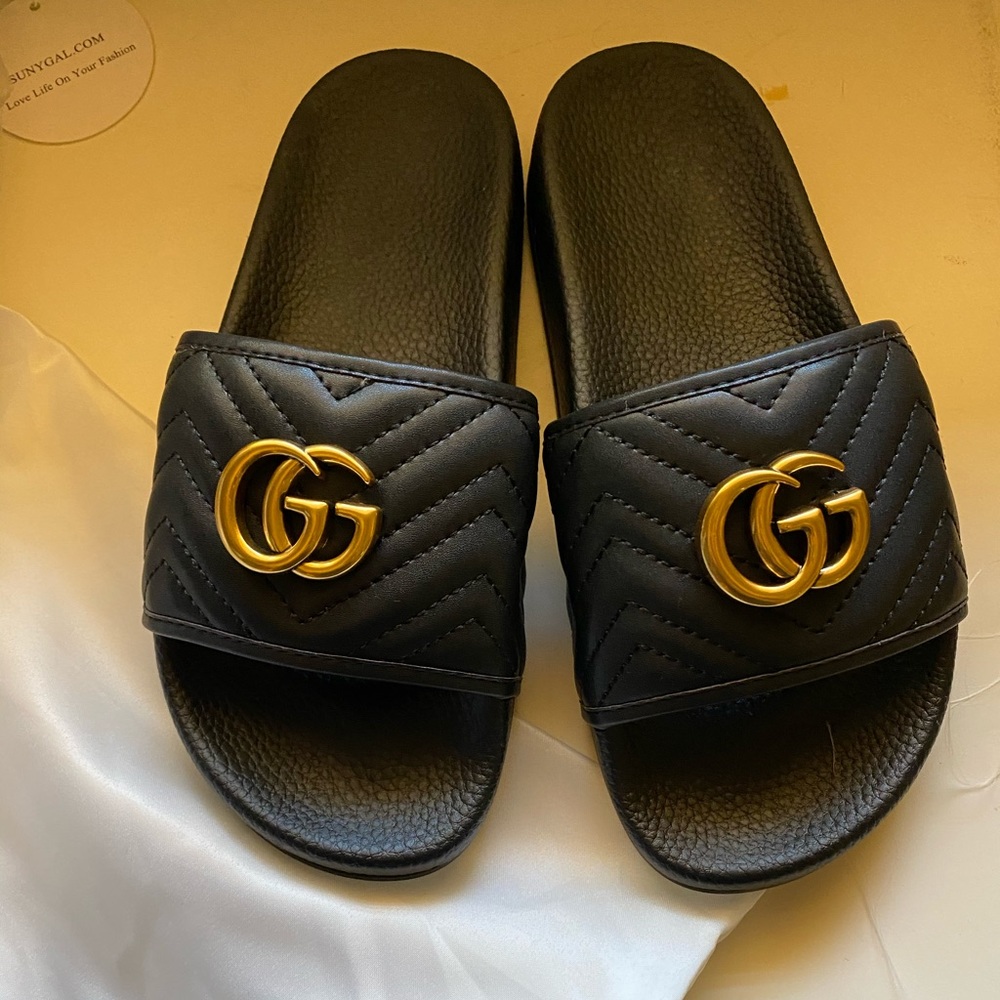 GG slides. Size 7. Never worn